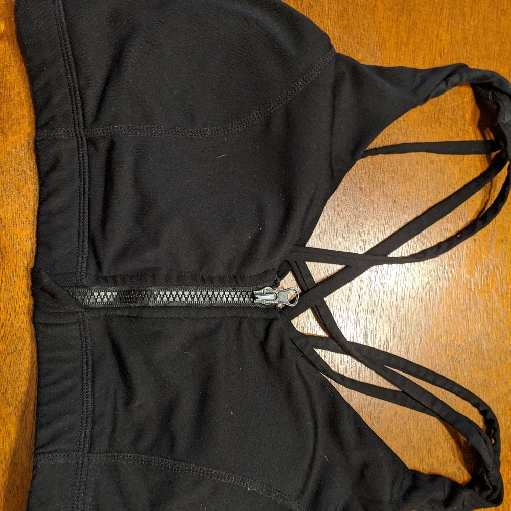 Black zip up sports bra. M.